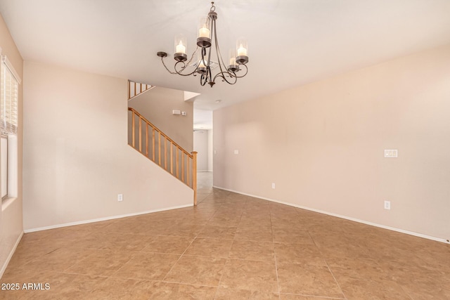 empty room with stairs, baseboards, and a chandelier