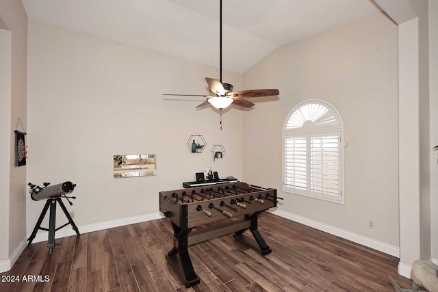 game room with lofted ceiling, ceiling fan, and dark hardwood / wood-style flooring