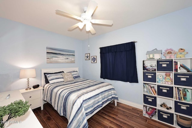 bedroom with dark wood-type flooring and ceiling fan