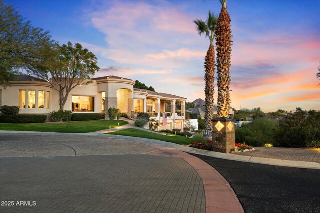 6621 N Arizona Biltmore Cir, Phoenix, AZ 85016 - view of front facade with a lawn and stucco siding