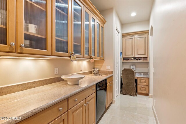 6621 N Arizona Biltmore Cir, Phoenix, AZ 85016 - kitchen with dishwasher, light stone countertops, glass insert cabinets, light tile patterned floors, and a sink