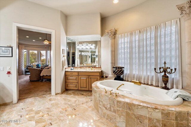 6621 N Arizona Biltmore Cir, Phoenix, AZ 85016 - ensuite bathroom featuring a garden tub, vanity, and a ceiling fan