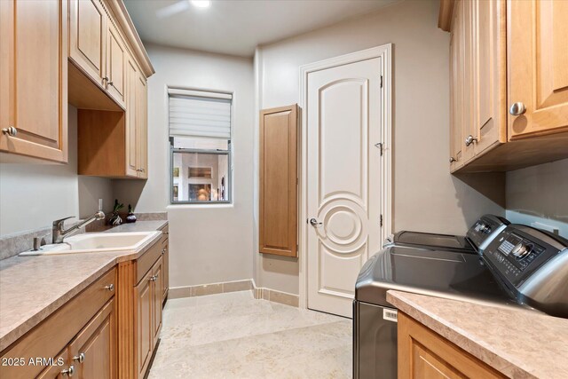 6621 N Arizona Biltmore Cir, Phoenix, AZ 85016 - clothes washing area featuring washer and dryer, baseboards, and cabinet space