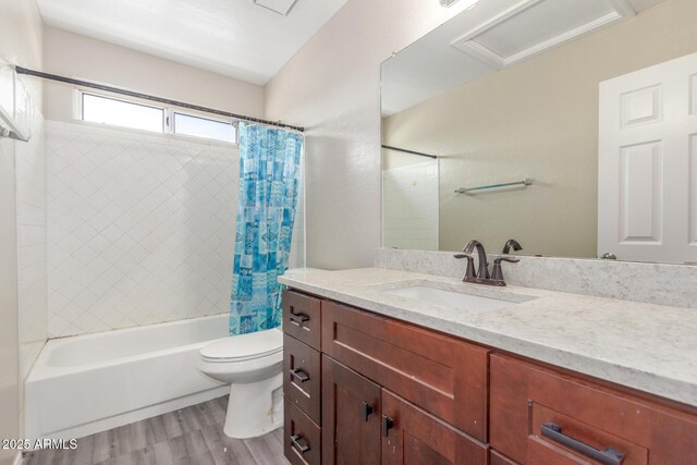3424 E Harmony Ave, Mesa, AZ 85204 - bathroom with vanity, shower / tub combo, wood finished floors, and toilet