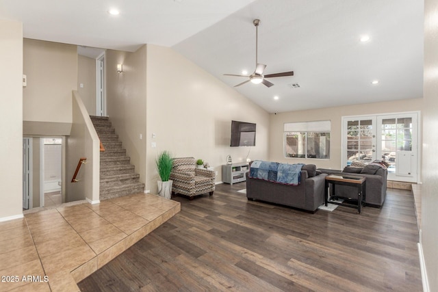 3424 E Harmony Ave, Mesa, AZ 85204 - living area featuring dark wood finished floors, ceiling fan, stairs, recessed lighting, and high vaulted ceiling