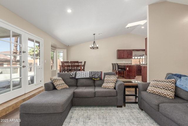 3424 E Harmony Ave, Mesa, AZ 85204 - living room with vaulted ceiling, a chandelier, recessed lighting, and french doors