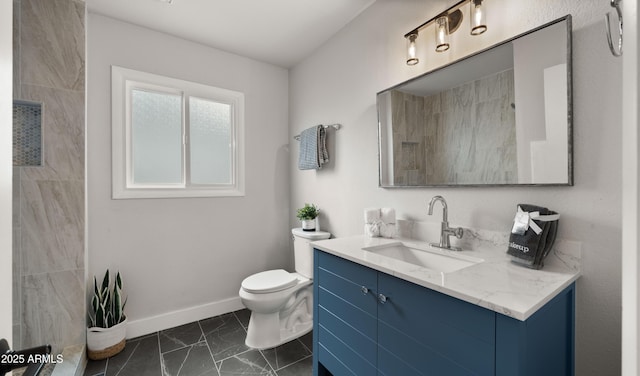 full bathroom with baseboards, marble finish floor, toilet, and vanity