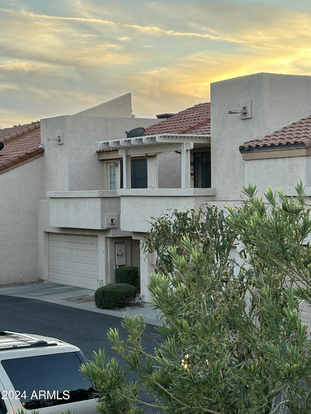 view of front of property with a garage