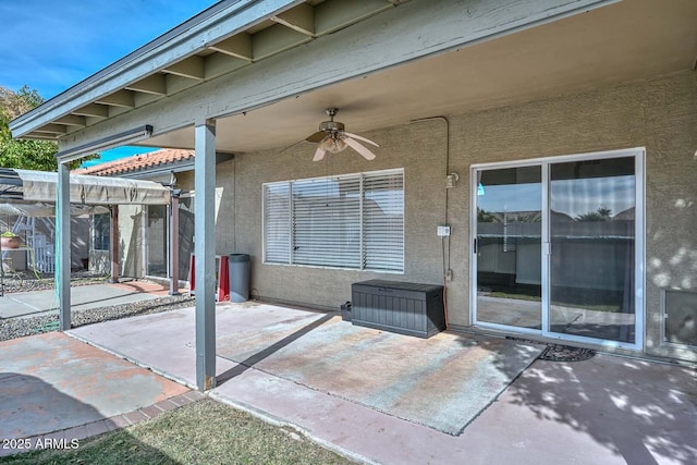 view of patio / terrace featuring ceiling fan