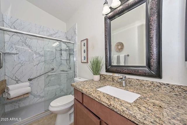 bathroom featuring toilet, a shower with door, vanity, and vaulted ceiling