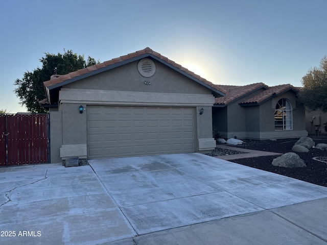 view of front of home with a garage