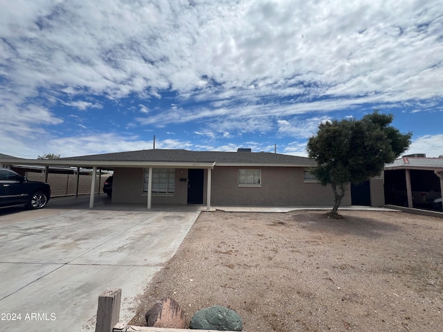 view of front of house featuring a carport