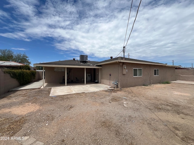 back of house featuring a patio and central AC