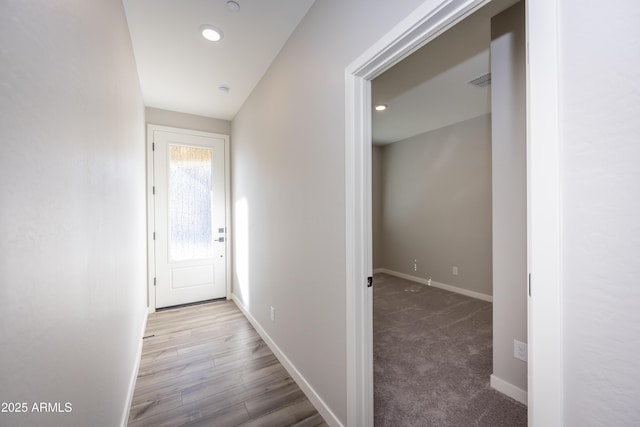 hallway featuring light hardwood / wood-style flooring