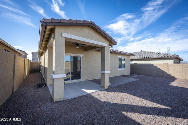 back of house featuring a patio, central AC, and ceiling fan