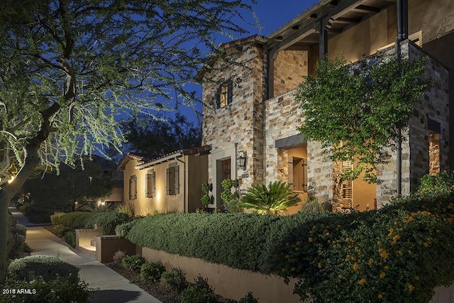 10287 E Diamond Rim Dr, Scottsdale, AZ 85255 - view of property exterior featuring stone siding and stucco siding