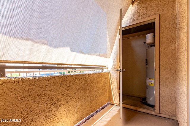 interior space featuring plenty of natural light and electric water heater