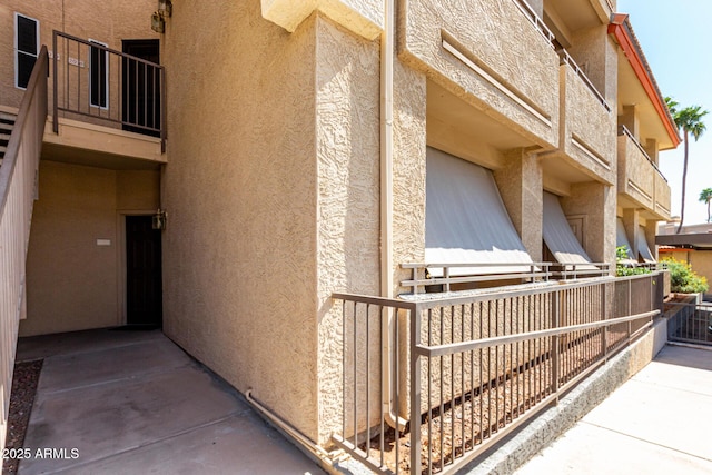 view of property exterior with stucco siding