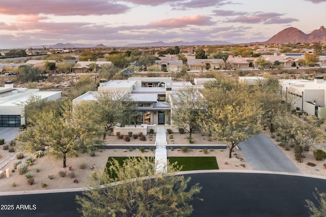 drone / aerial view with a mountain view and a residential view