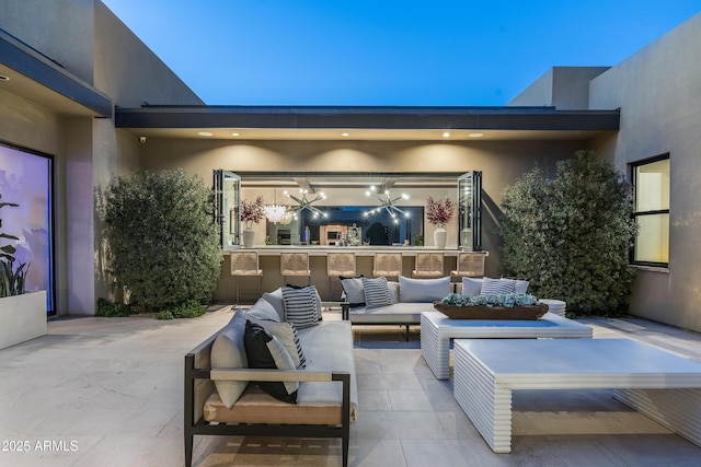 view of patio featuring outdoor lounge area and exterior kitchen