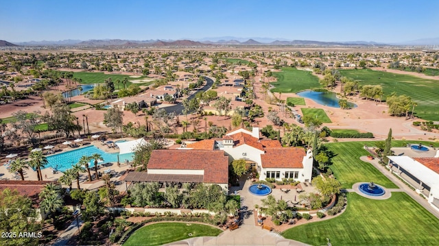 aerial view featuring a mountain view and golf course view