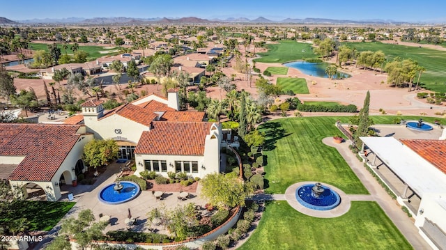 bird's eye view featuring a mountain view and golf course view