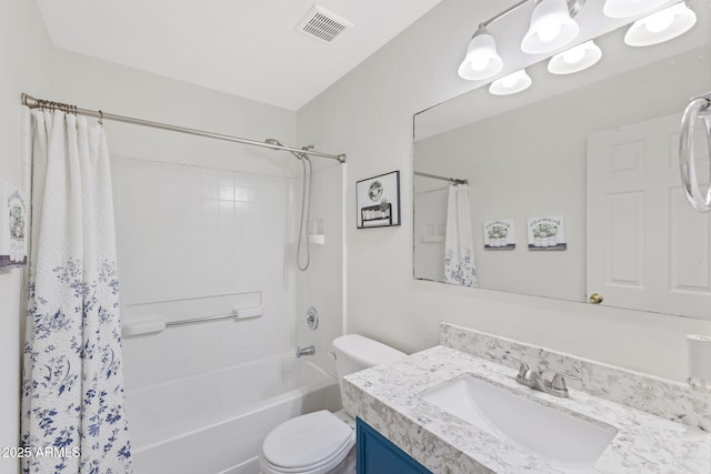 bathroom with toilet, shower / tub combo, vanity, and visible vents