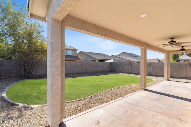 view of patio with ceiling fan