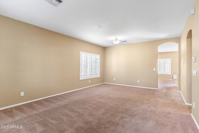 view of carpeted spare room