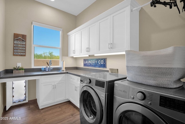 29067 N 71st Ave, Peoria, AZ 85383 - laundry area with cabinet space, independent washer and dryer, and wood finished floors