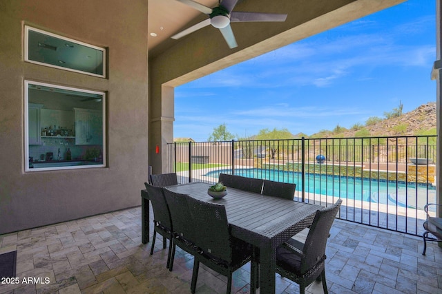 29067 N 71st Ave, Peoria, AZ 85383 - fenced backyard with ceiling fan, a patio area, and outdoor dining space