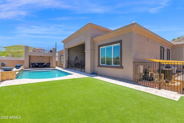 29067 N 71st Ave, Peoria, AZ 85383 - back of property featuring ceiling fan, stucco siding, and a patio