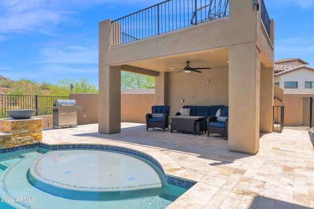 29067 N 71st Ave, Peoria, AZ 85383 - view of pool featuring an outdoor living space, a patio area, ceiling fan, and an outdoor kitchen