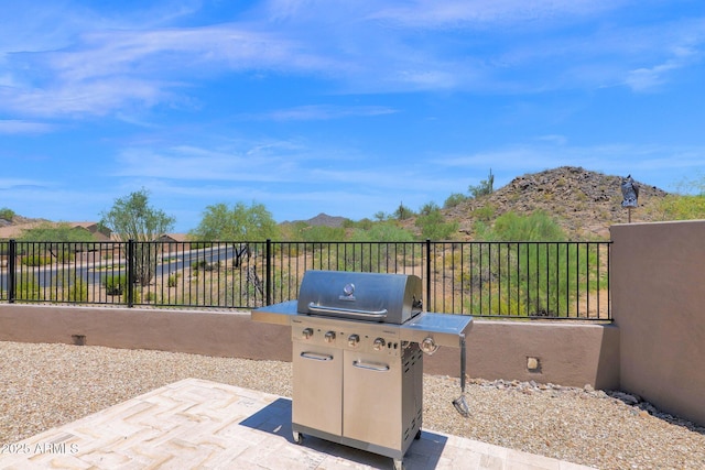 29067 N 71st Ave, Peoria, AZ 85383 - view of patio / terrace featuring a grill and a mountain view