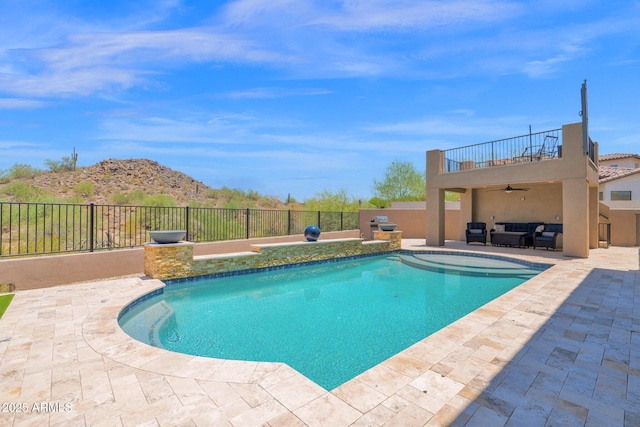 29067 N 71st Ave, Peoria, AZ 85383 - view of swimming pool featuring ceiling fan, a patio area, outdoor lounge area, and a mountain view