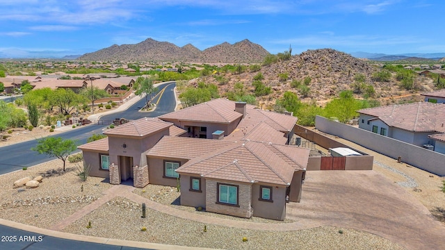 29067 N 71st Ave, Peoria, AZ 85383 - view of front of house with stucco siding, a tiled roof, a mountain view, and a residential view