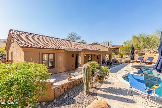 view of front of property featuring a patio