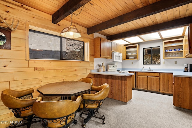 246 E Acorn Ln, Payson, AZ 85541 - kitchen featuring white appliances, a wooden ceiling with exposed beams, brown cabinetry, a peninsula, and wood walls