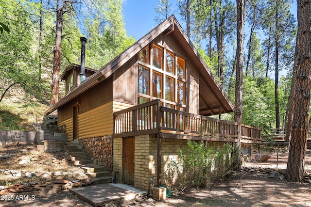 246 E Acorn Ln, Payson, AZ 85541 - view of property exterior featuring stairs and a deck