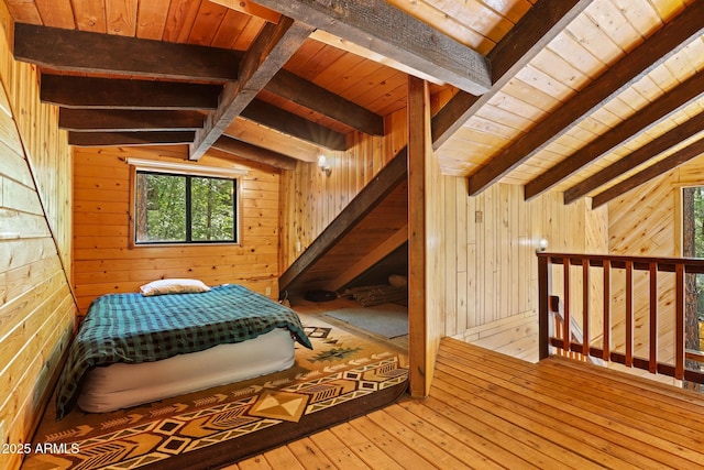 246 E Acorn Ln, Payson, AZ 85541 - bedroom featuring wooden walls, a wood ceiling with exposed beams, and hardwood / wood-style floors