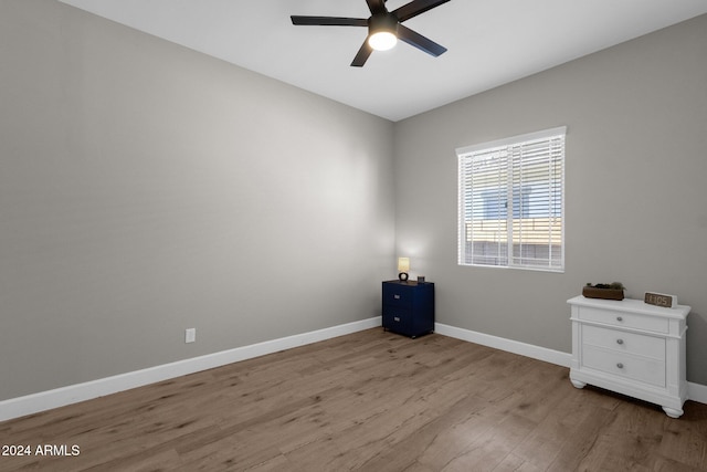 unfurnished room featuring ceiling fan and light hardwood / wood-style floors