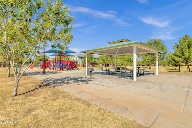 surrounding community featuring a playground and a gazebo