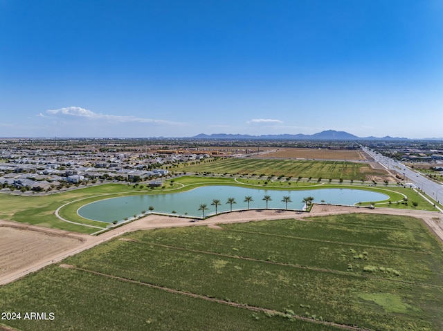 aerial view featuring a water and mountain view