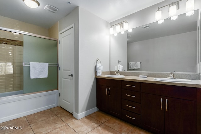 bathroom with vanity and tile patterned floors