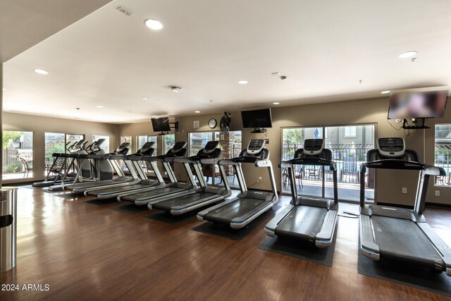 gym with hardwood / wood-style flooring