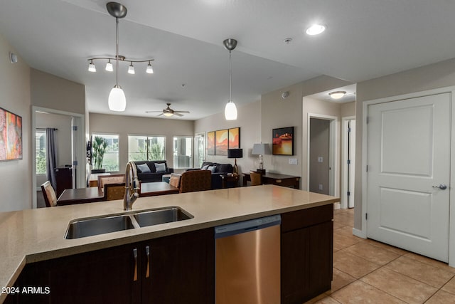 kitchen with dark brown cabinets, dishwasher, pendant lighting, sink, and ceiling fan