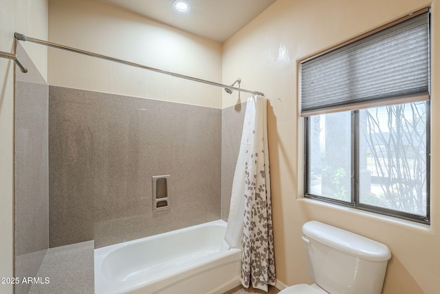 full bathroom featuring toilet, shower / bath combination with curtain, and recessed lighting
