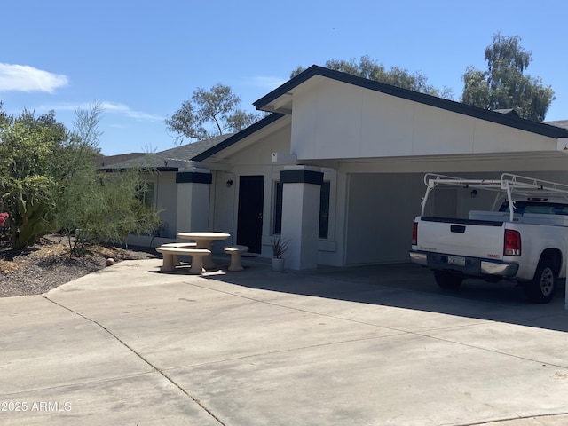903 W Jacinto Cir, Mesa, AZ 85210 - view of front of home with driveway and an attached garage