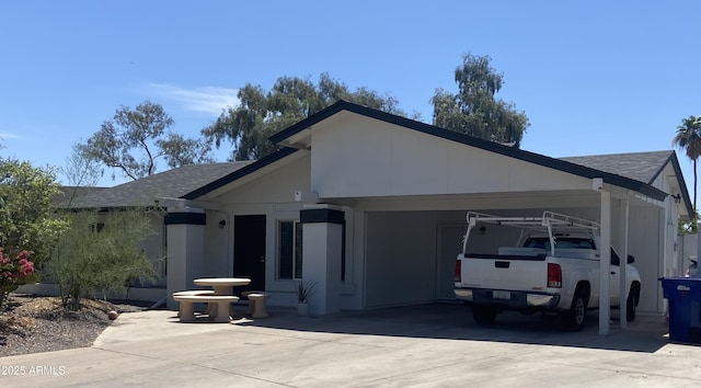 903 W Jacinto Cir, Mesa, AZ 85210 - single story home featuring a shingled roof, a carport, and concrete driveway
