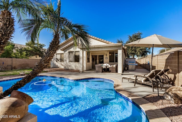 view of pool featuring a patio area and outdoor lounge area